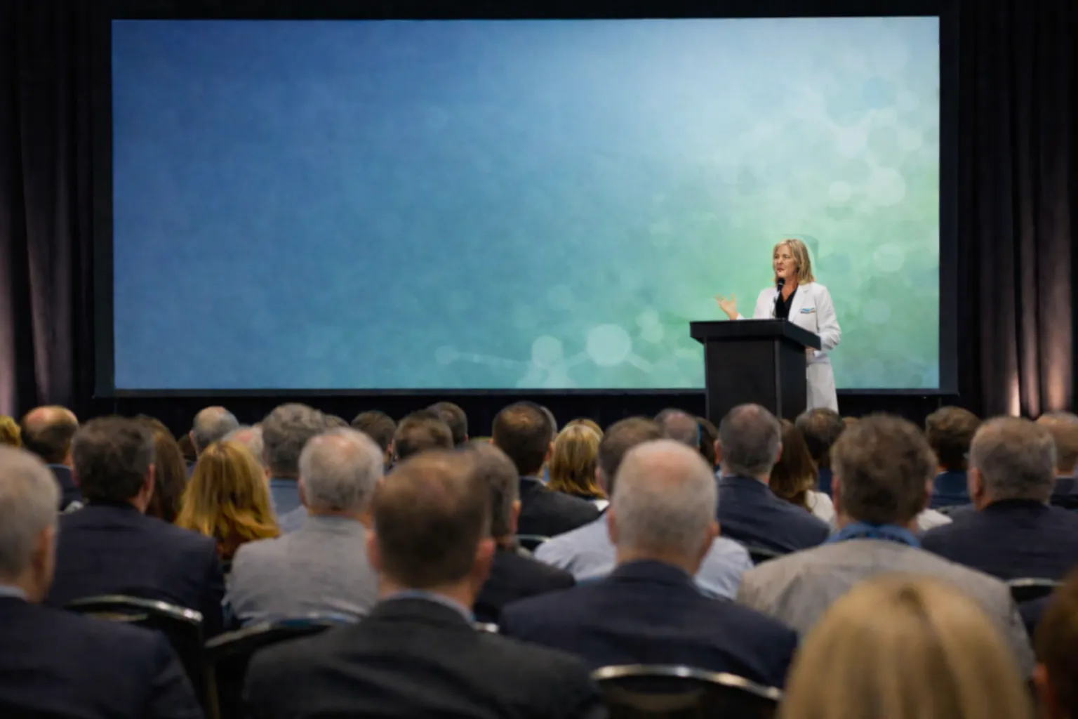 Real estate professionals looking at blueprints